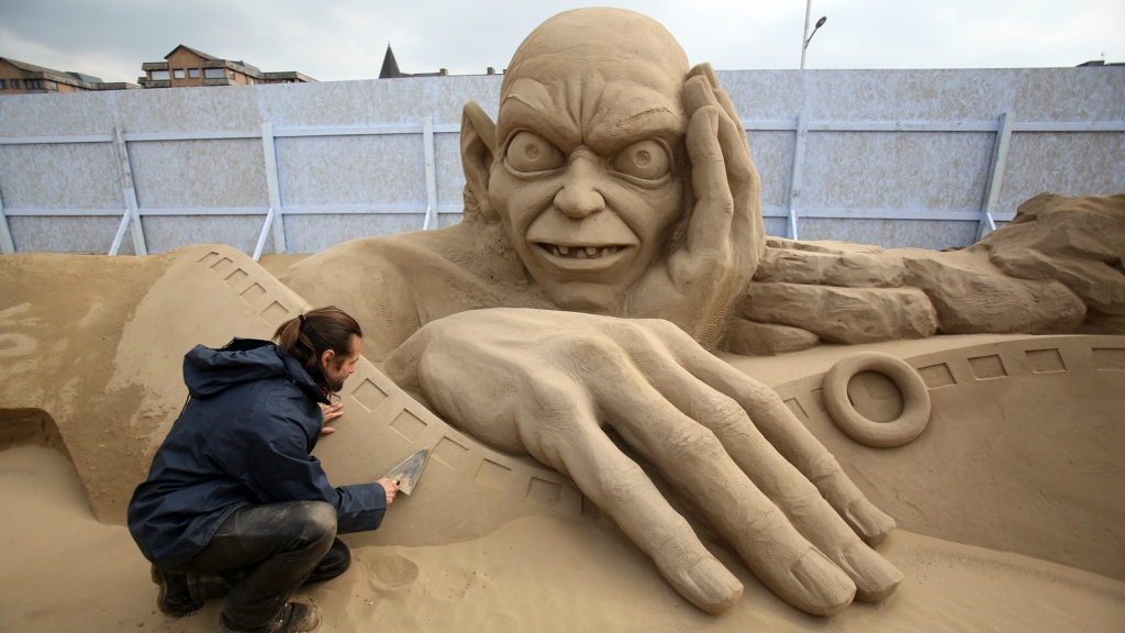 Sculptors Place The Finishing Touches To Their Hollywood Themed Sand Sculptures